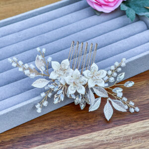 Wedding Flower Hair Comb and Pin with rhinestones, blue opal crystals, and white ceramic flowers. Perfect for weddings, proms, and special occasions.