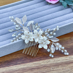 Wedding Flower Hair Comb and Pin with rhinestones, blue opal crystals, and white ceramic flowers. Perfect for weddings, proms, and special occasions.