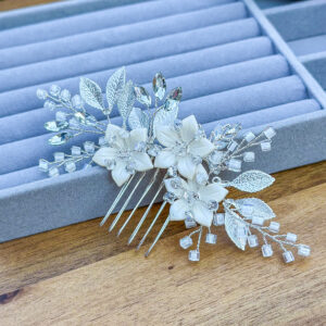 Wedding Flower Hair Comb and Pin with rhinestones, blue opal crystals, and white ceramic flowers. Perfect for weddings, proms, and special occasions.